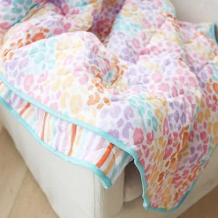 Posh Peanut Reversible Quilted Patoo® Blanket Shop